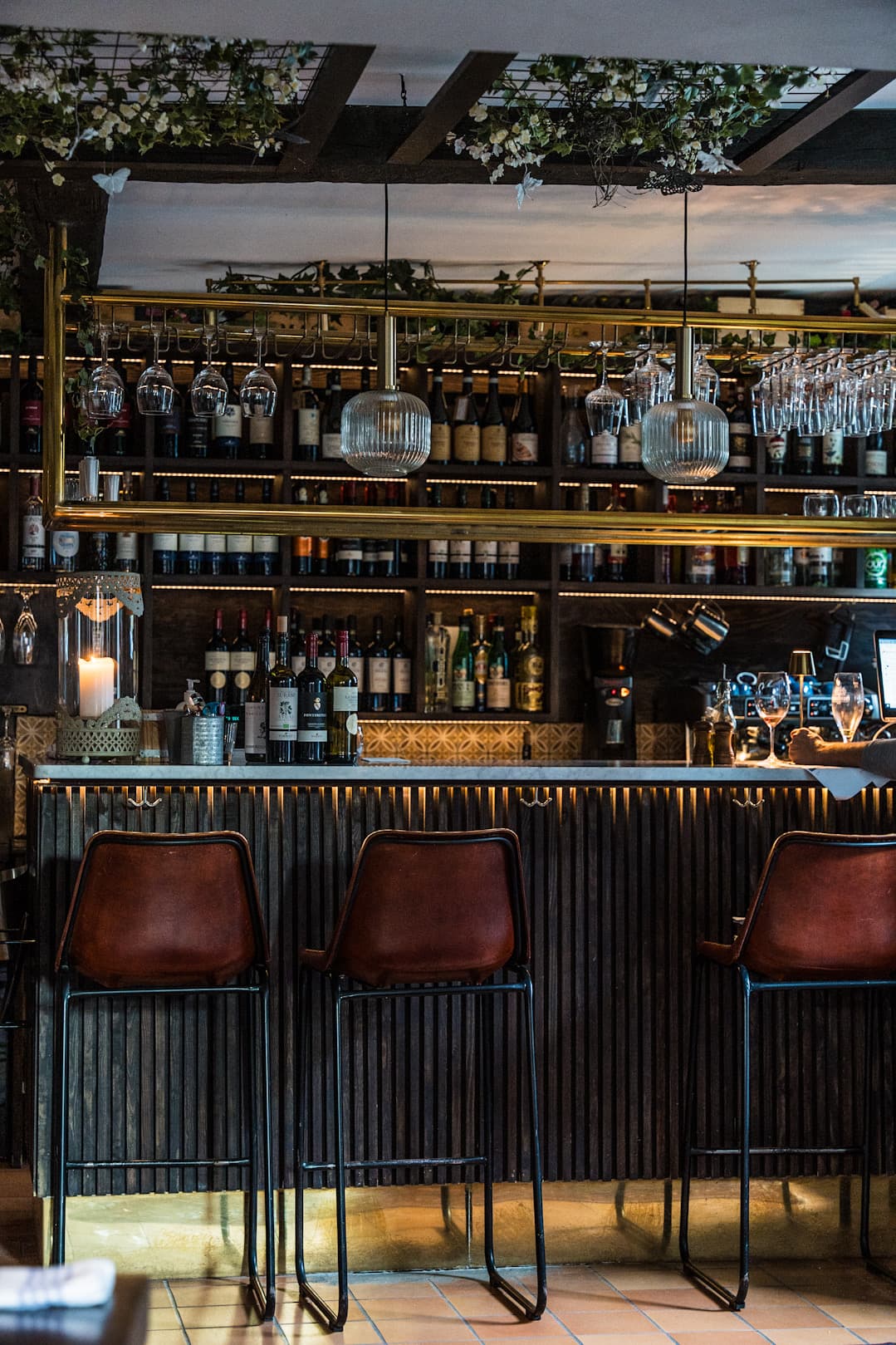 Brass bar with leather stools